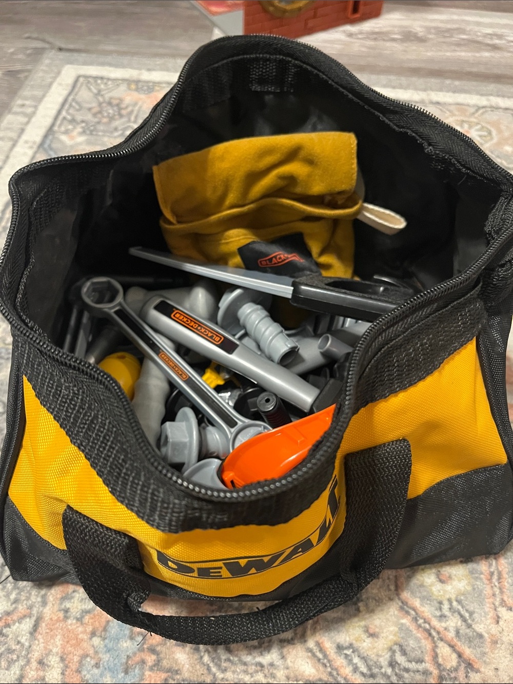 Kids DEWALT Yellow and Black Tool Bag with kids tools